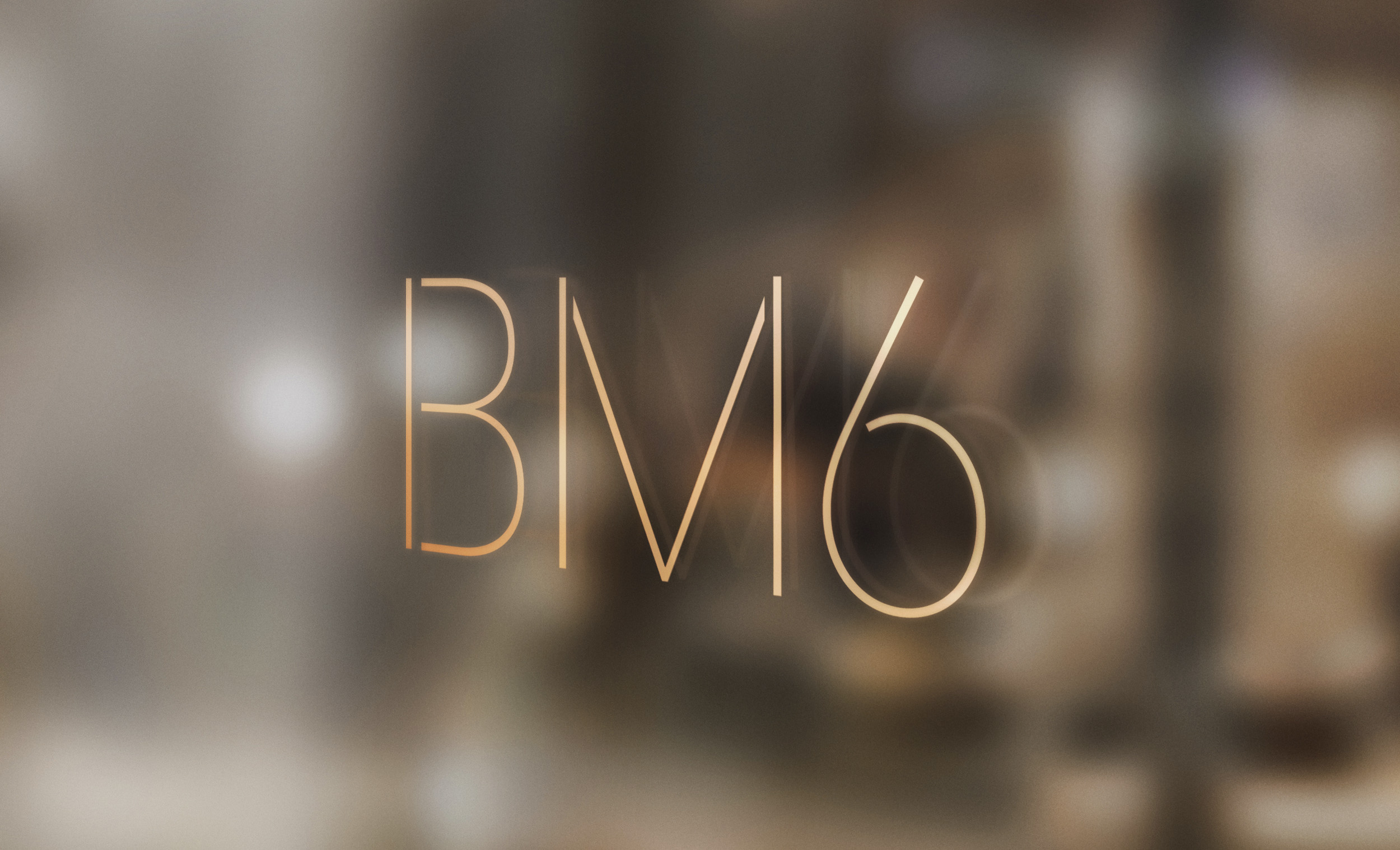 E20_BM6_Logo_Glass